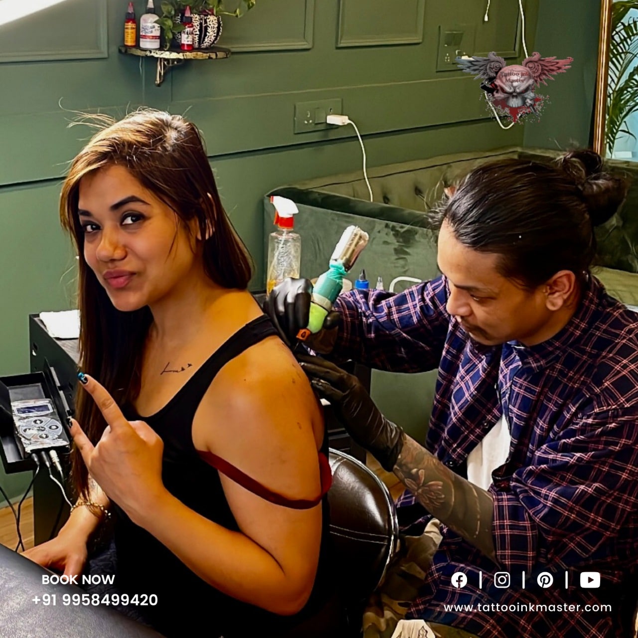 Tattoo artist working with a client at Tattoo Ink Master