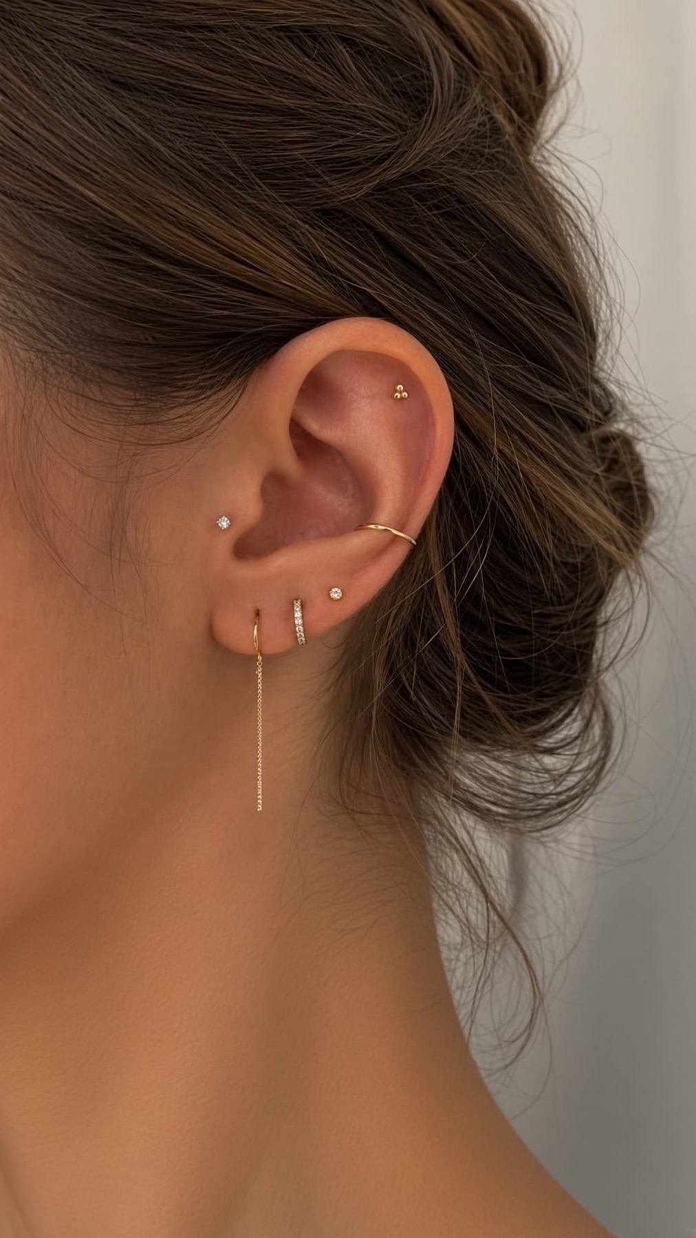 Ear styling with multiple delicate piercings