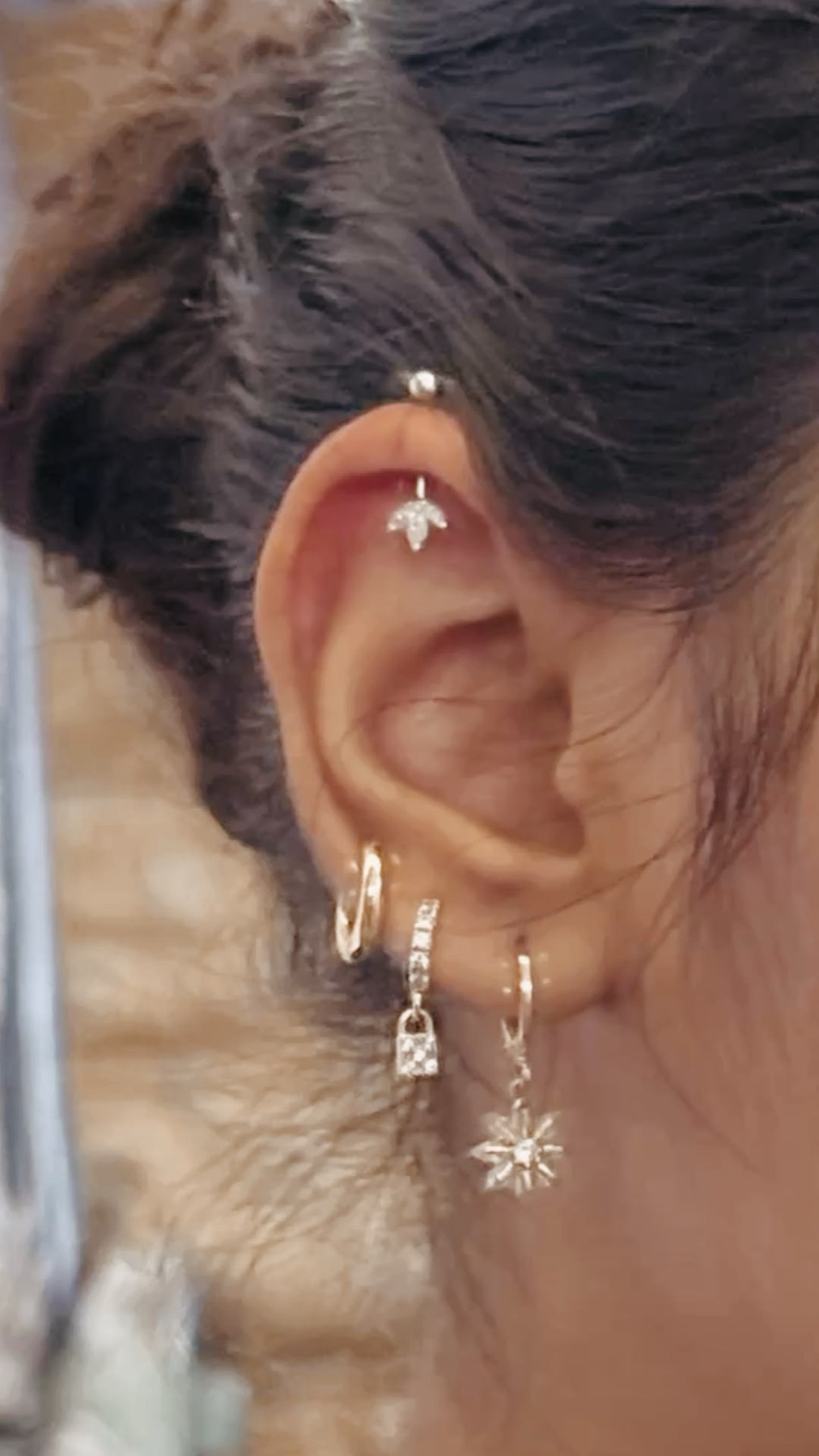 Ear piercings with decorative jewelry