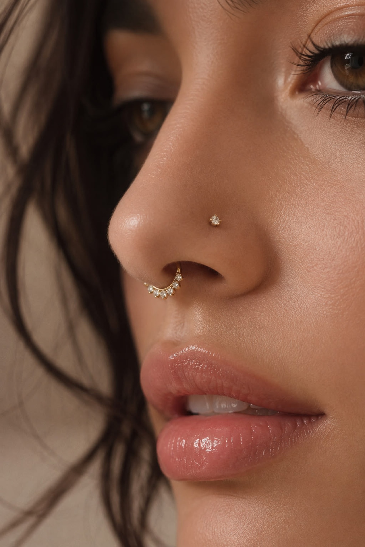 Nose piercing with a nostril stud and septum jewelry