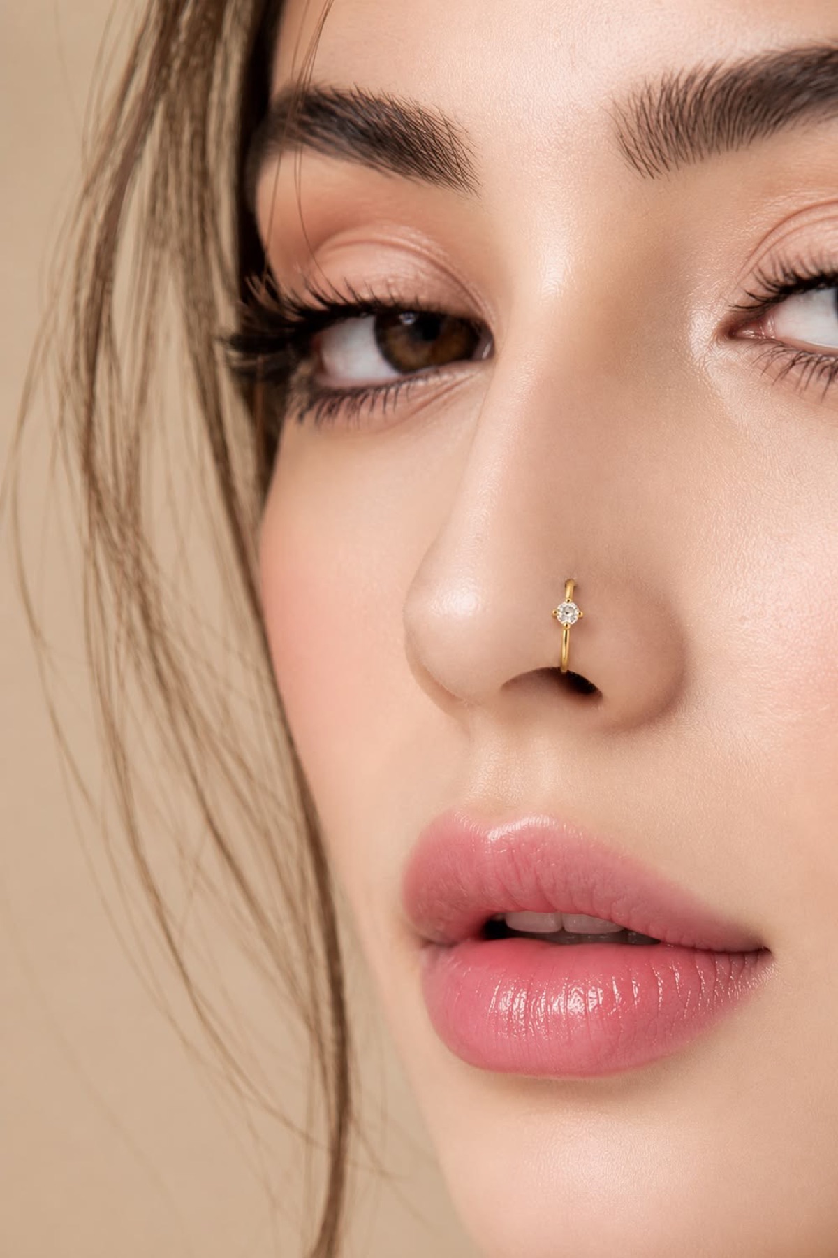 Nose hoop piercing