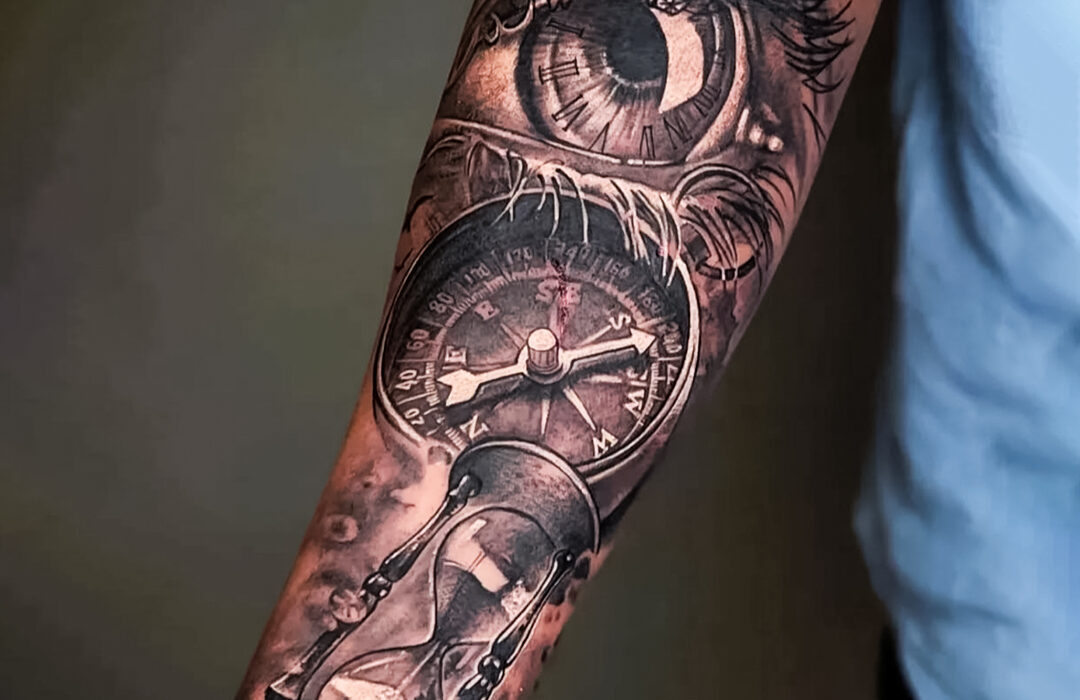 Detailed compass and hourglass tattoo design by Tattoo Ink Master