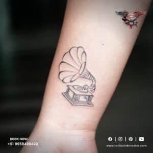 Read more about the article Vintage Style Gramophone Tattoo In Small Size