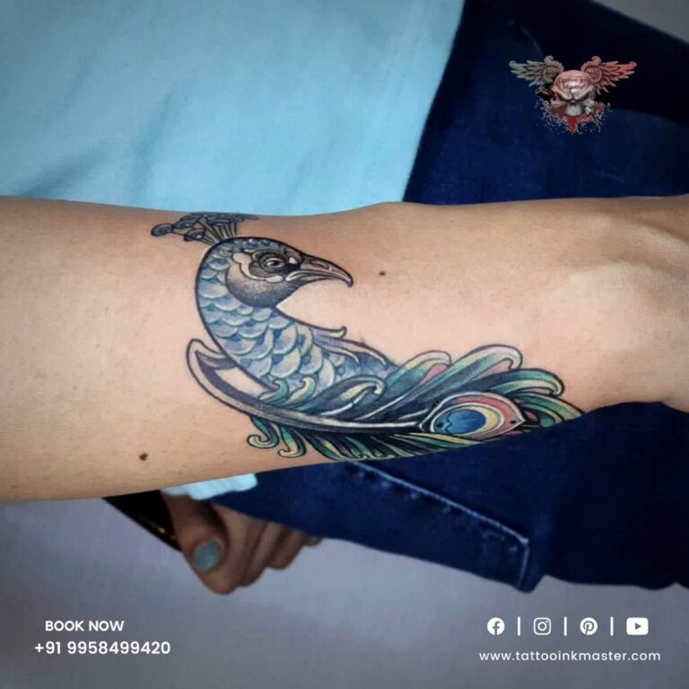 Read more about the article The Queen of Colours Peacock Tattoo