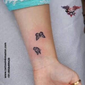 Read more about the article The Tiny Roving Butterflies Tattoo