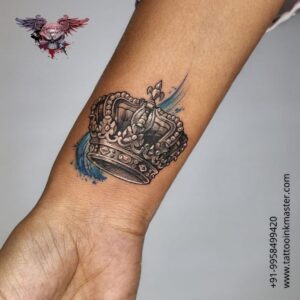 Read more about the article Colorful Arm Tattoo of King’s Crown